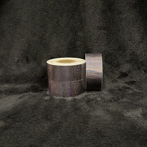 Roll of Black Sparkles hula hoop tape on a black background