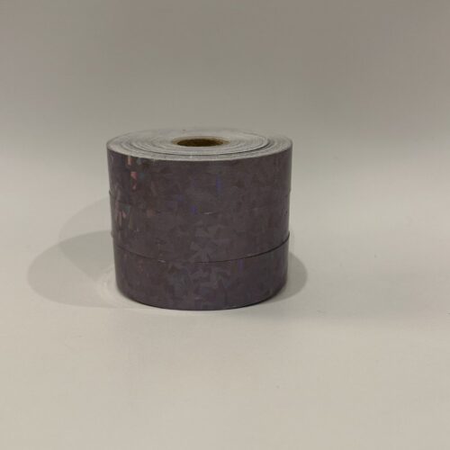 Roll of Cracked Ice Black hula hoop tape on a black background