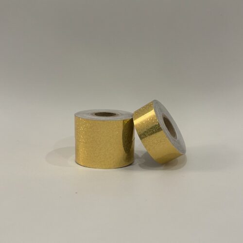 Roll of Gold Glitter hula hoop tape on a white background