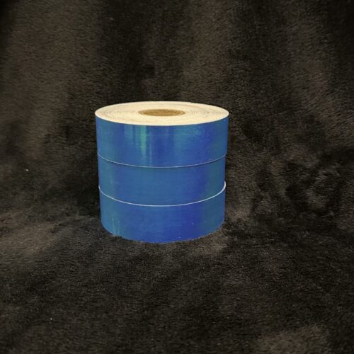 Roll of Iridescent Blue hula hoop tape on a black background